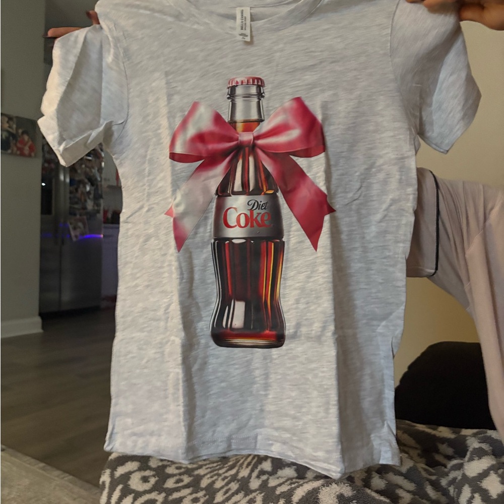 Diet Coke with pink bow youth L T-shirt 
Bella Canvas brand - color Gray